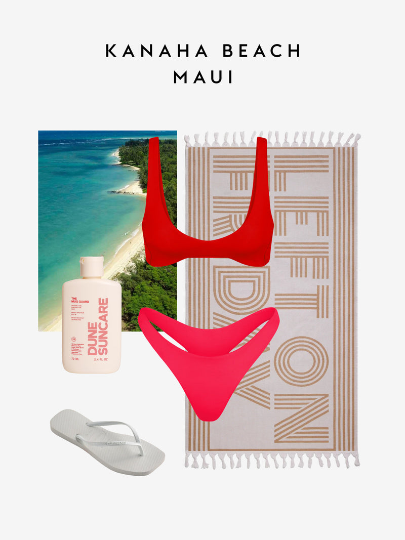 A beach-themed flat lay featuring a red bikini top and pink bikini bottom, a white and beige patterned beach towel, a white flip-flop, a bottle of Sun Care sunscreen, and a tropical ocean beach photo, with the text 'KANAHA BEACH MAUI' at the top.