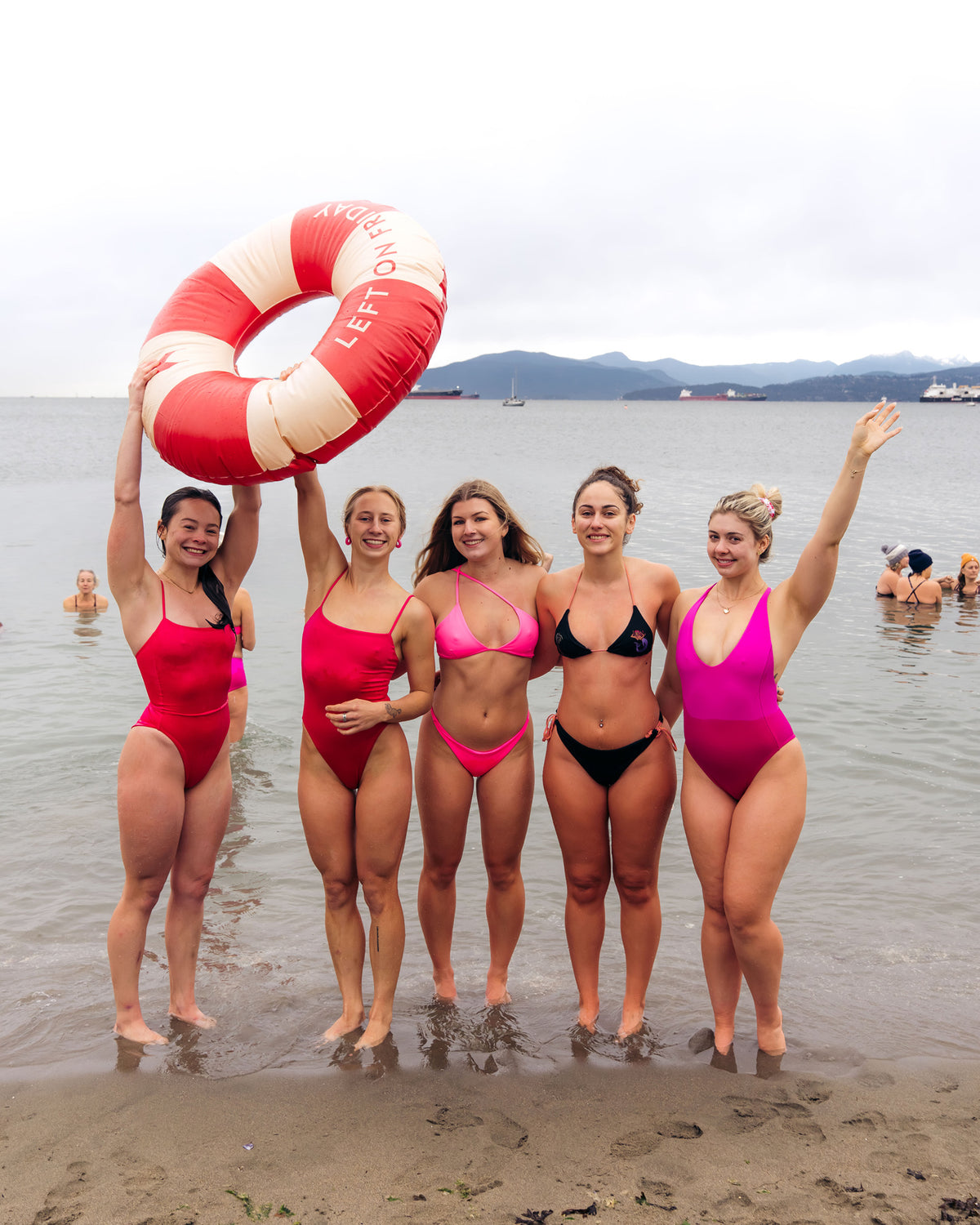 Customers modelling Left On Friday swimwear at the Check Yourself event