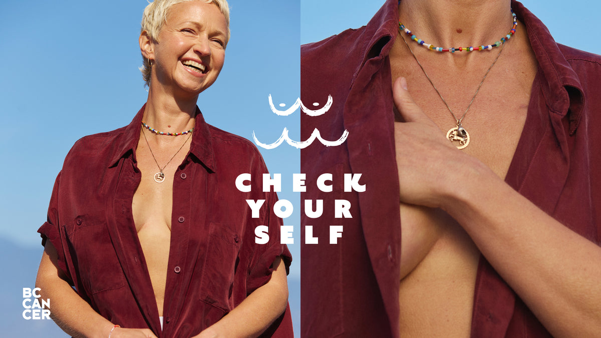 A split-screen lifestyle image showing Ashleigh Ball outdoors against a blue sky, wearing open Day Trip button-up in Jam and layered necklaces. Large white text reads 'CHECK YOUR SELF' with a simple wave graphic, and a small 'BC CANCER' logo appears in the lower left.