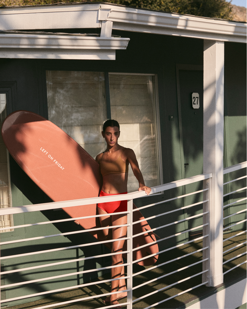 Woman in pool days top in tan lines + barrel bottom in sweet chili heat