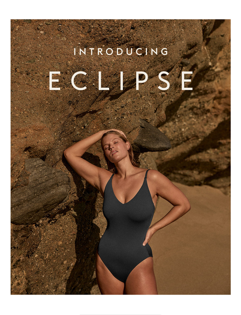 Woman wearing Sunday Suit in Eclipse