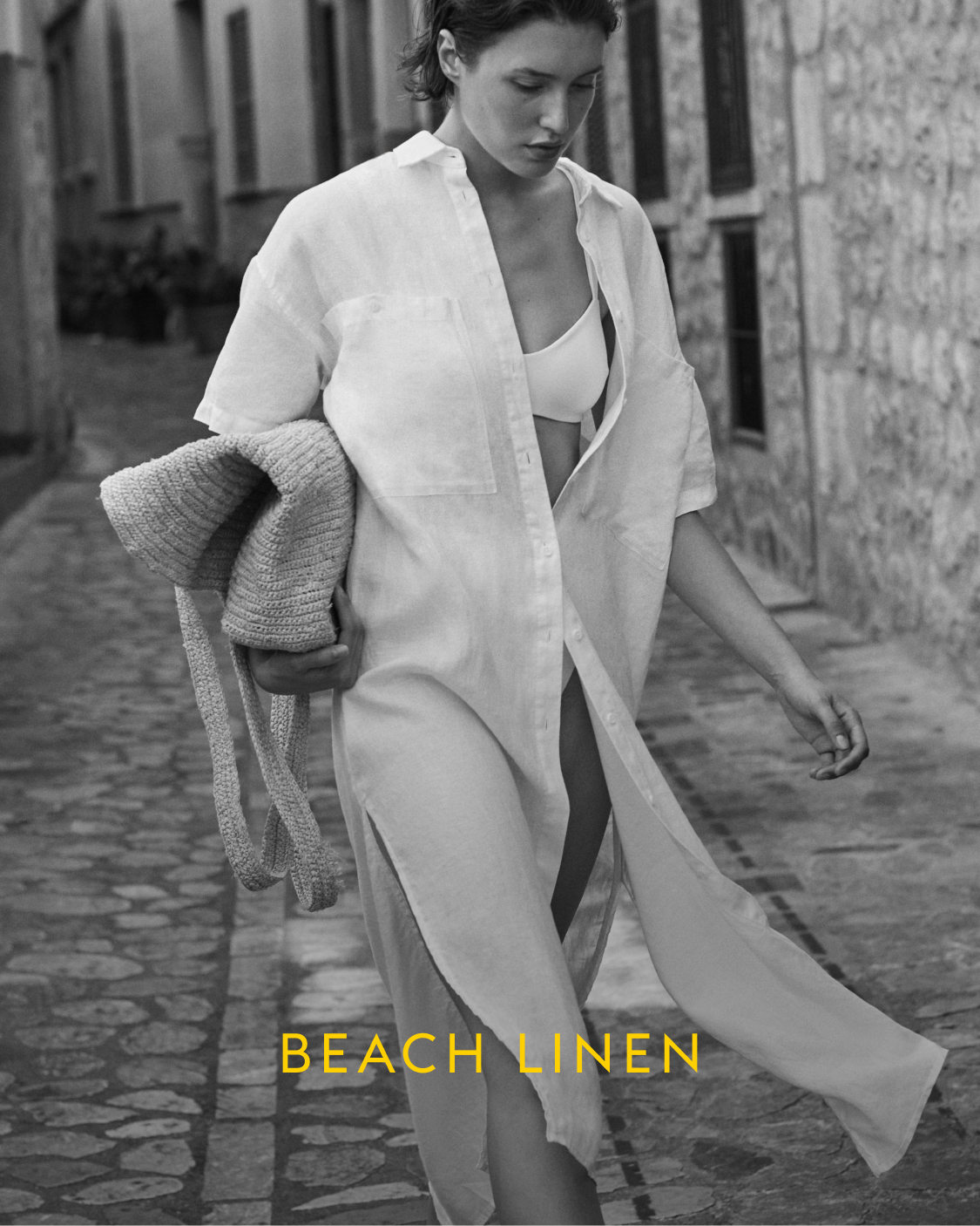 Woman in a white linen outfit walking outdoors with 'Beach Linen' text.