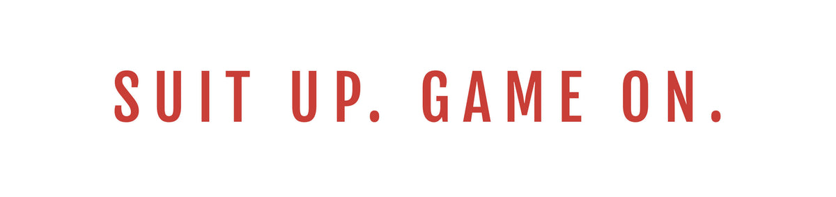 The text 'SUIT UP. GAME ON.' is printed in a coral-red sans-serif font across a plain white background.