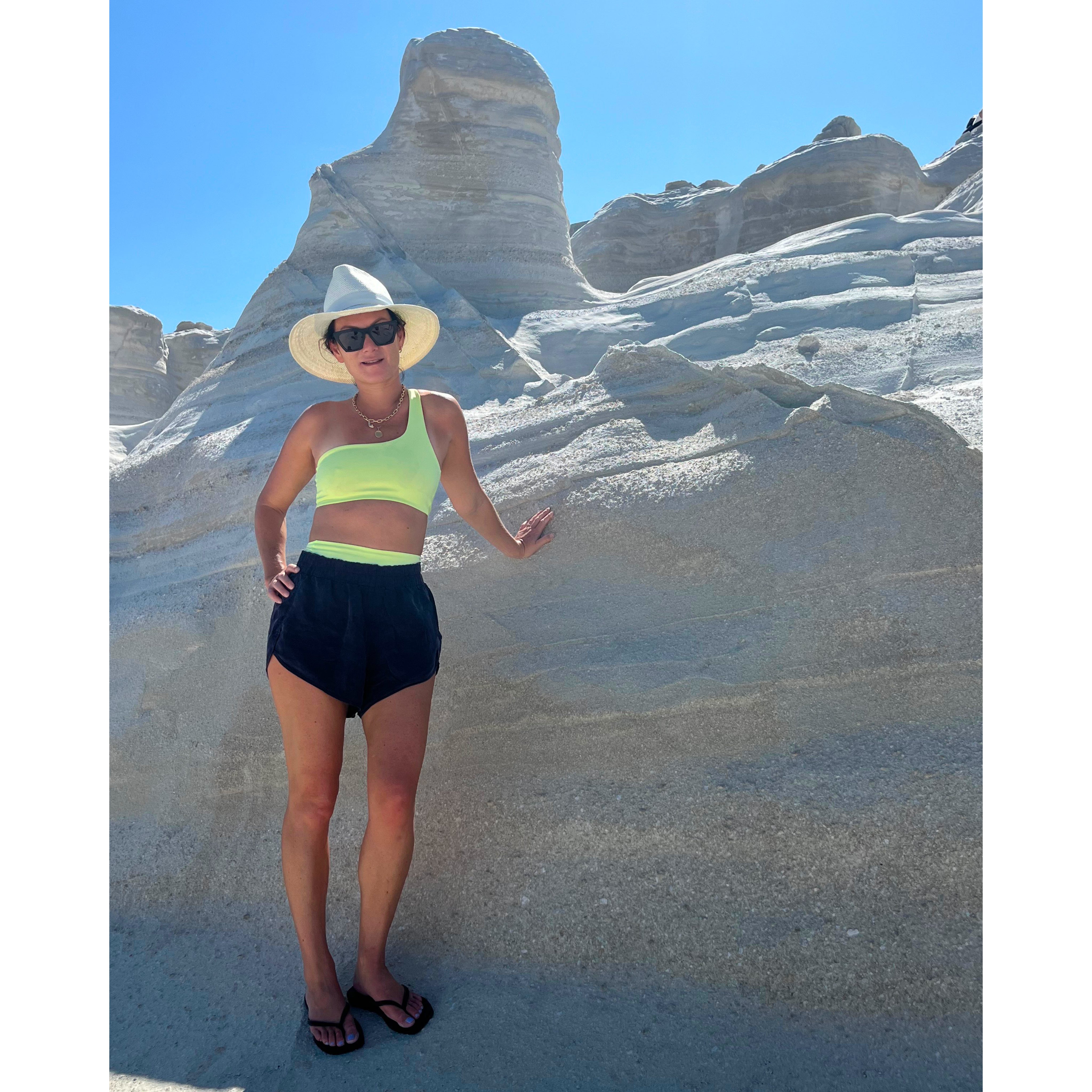 Laura Low Ah Kee in Greece in Left On Friday swimsuit and shorts